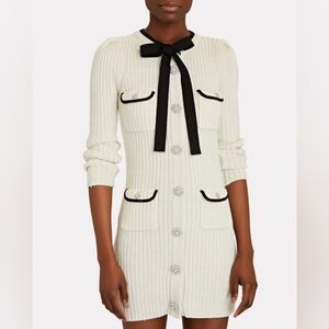 Metallic knit crew neck long sleeve dress, jeweled buttons, tie, pockets